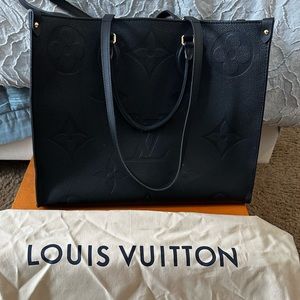 Authentic pre owned Louis Vuitton black On the go